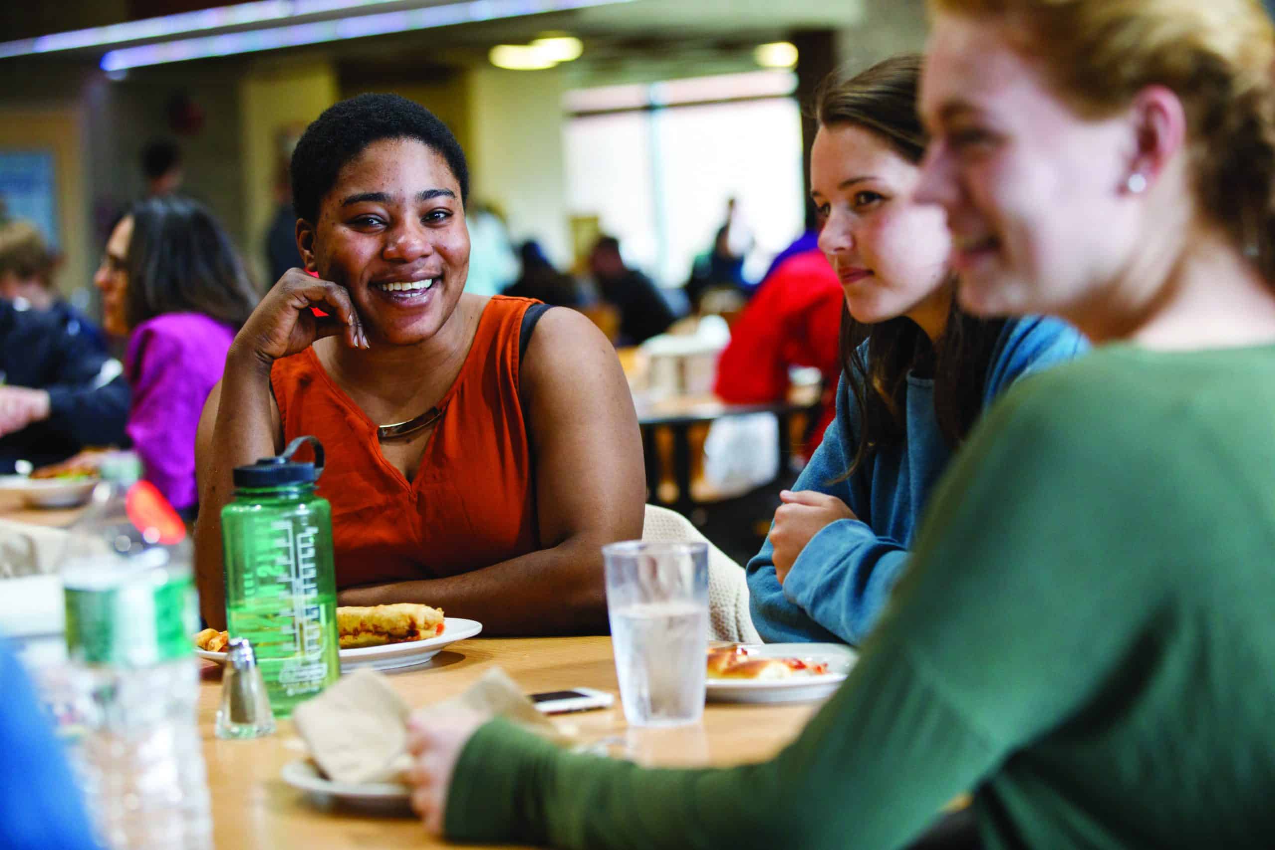 Group of female students enjoy lunch on the Lyndon campus
