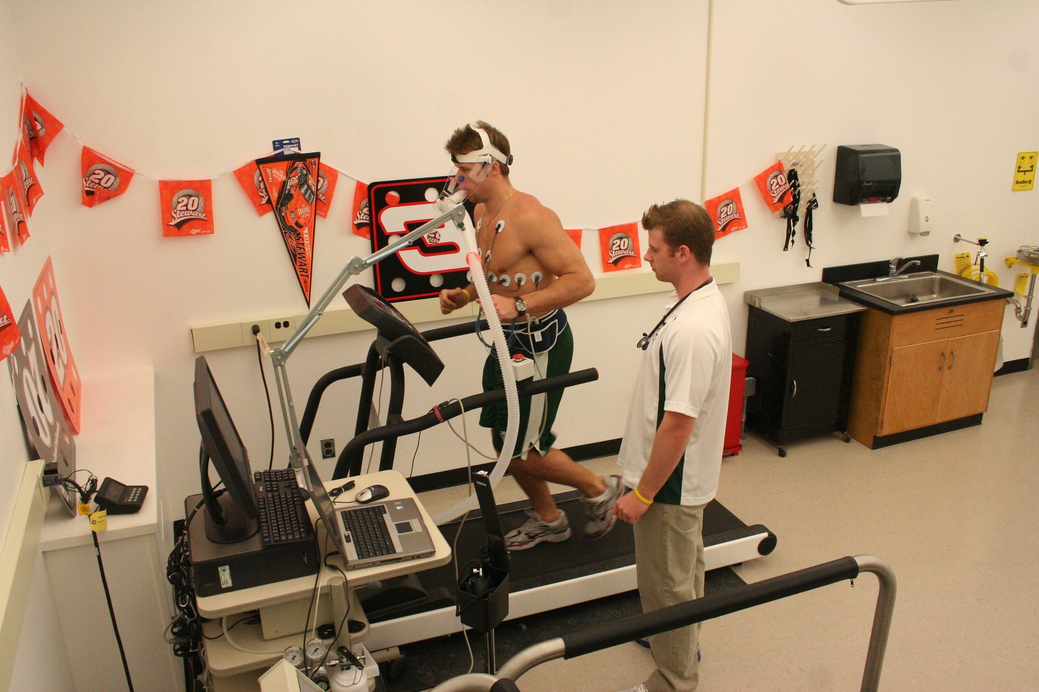 A man running on a treadmill at Vermont State University.