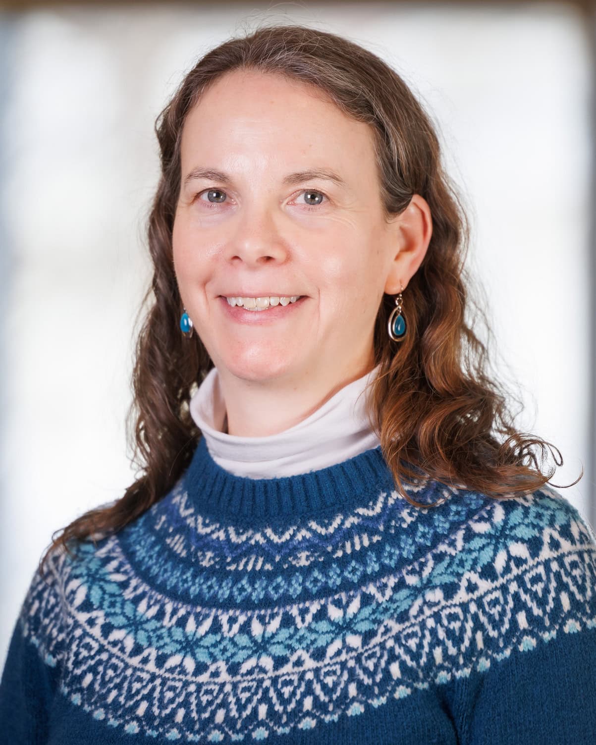 Kristen Ross smiling at the camera