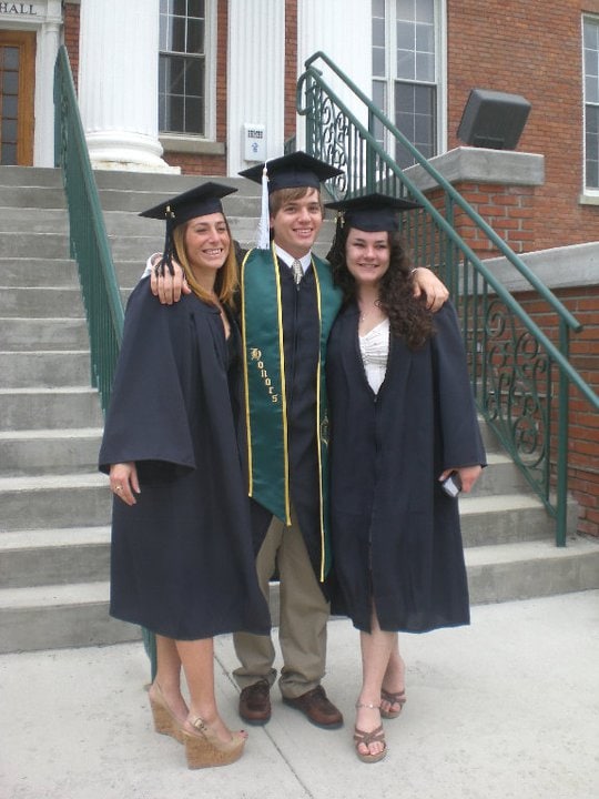Jessica posing with friends at the 2011 Castleton Commencement.