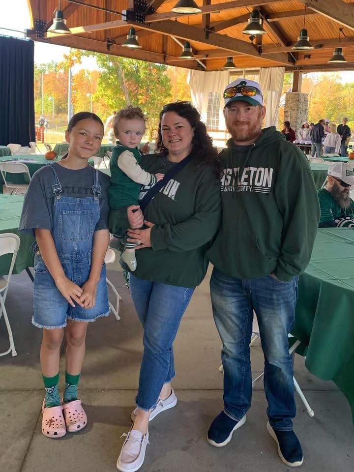 Jessica and her family at Castleton homecoming: husband Matthew, daughter, Jada, and son Rowan. 