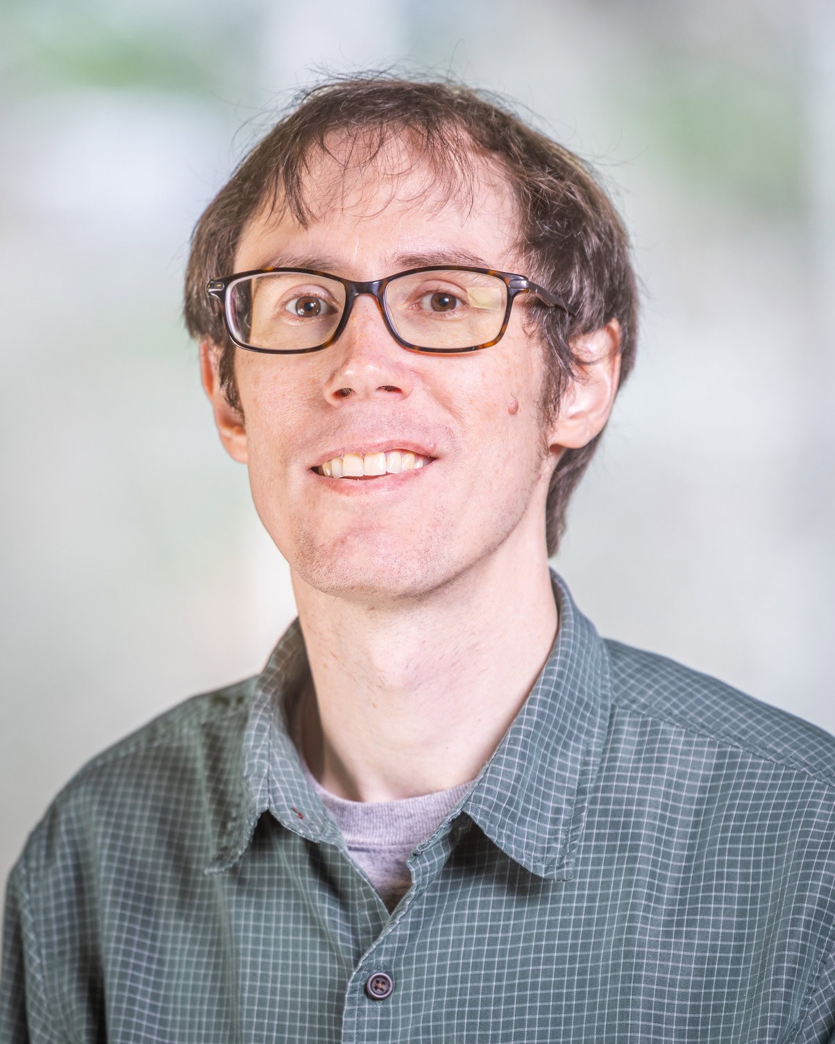 Ryan McClure smiling at the camera