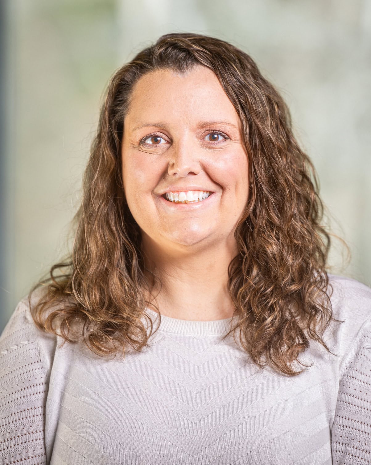 Sara Lussier smiling at the camera