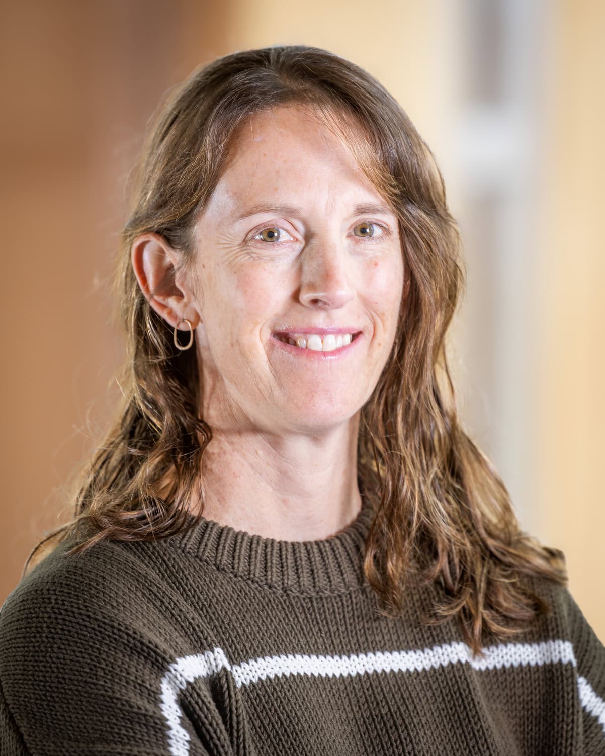 Kate Renner smiling at the camera