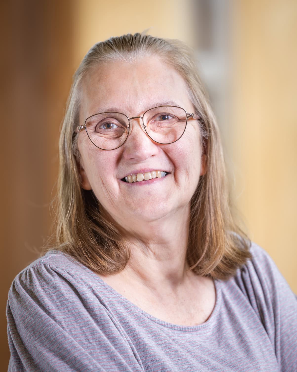 Monique Prive smiling at the camera