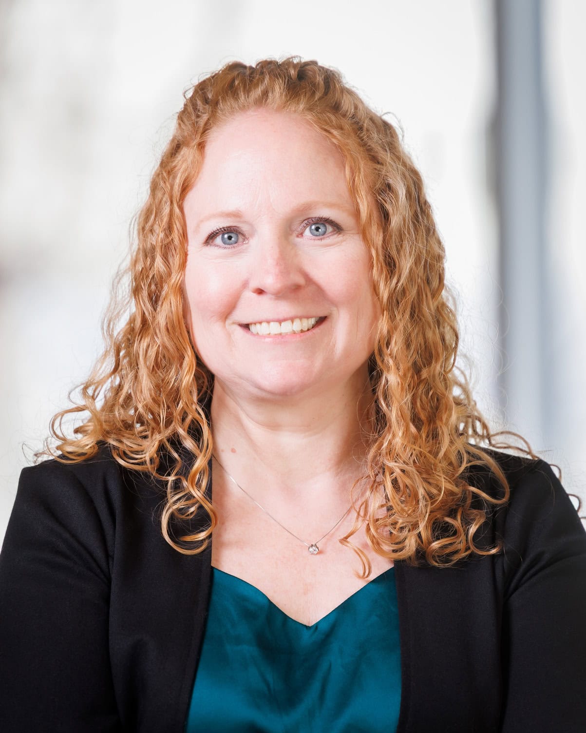 Hillary Harrison smiling at the camera