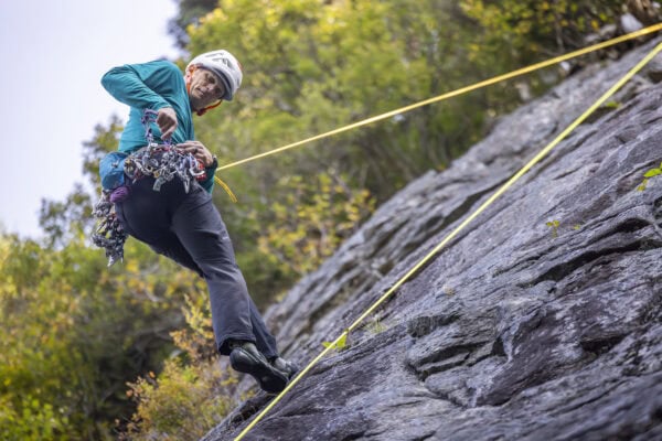 Professor Ben Mirkin rock climbing in Franconia, NH