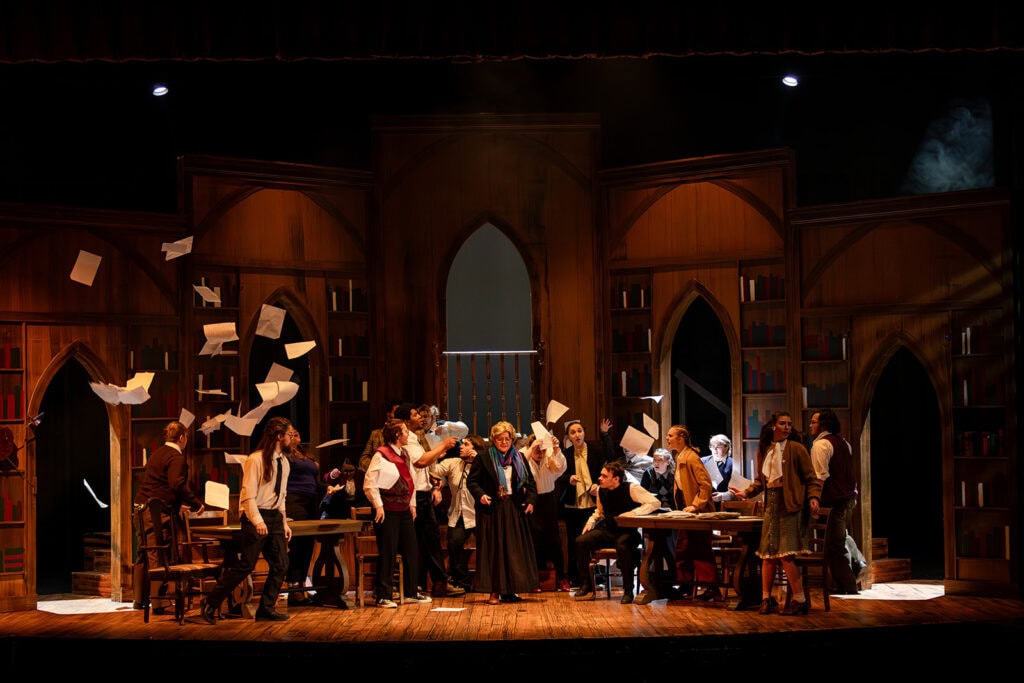 A large group of students performing Hamlet at VTSU Castleton.