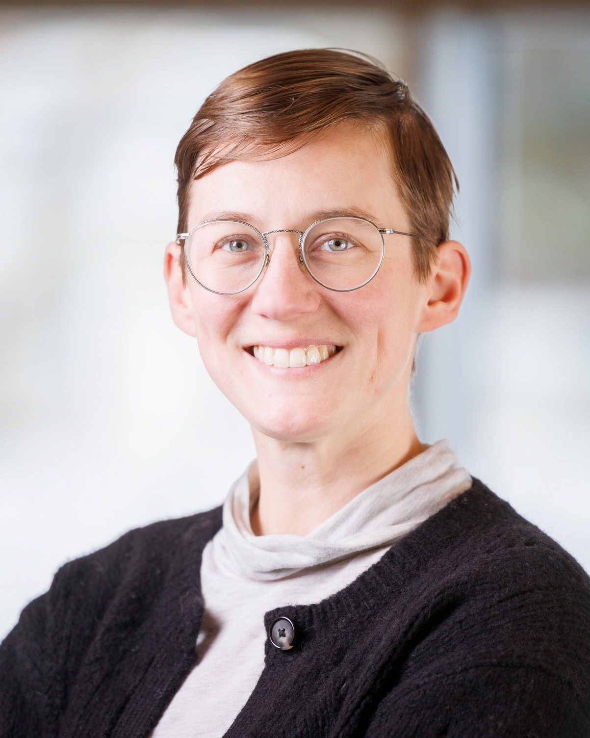 Elise Wallace smiling at the camera