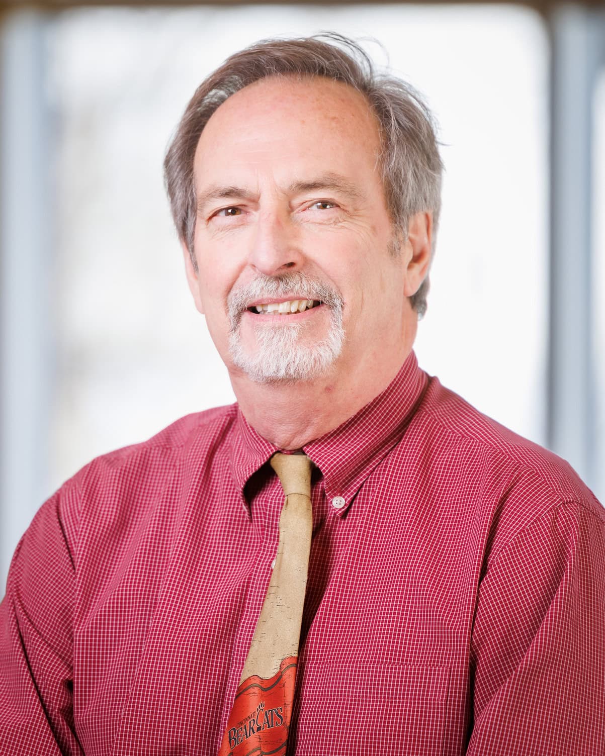 William (Bill) Lucci smiling at the camera