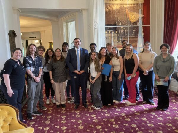 McNair scholars gathered in the lobby of the Vermont statehouse