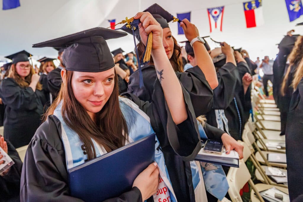 A row of graduates in caps and gowns 